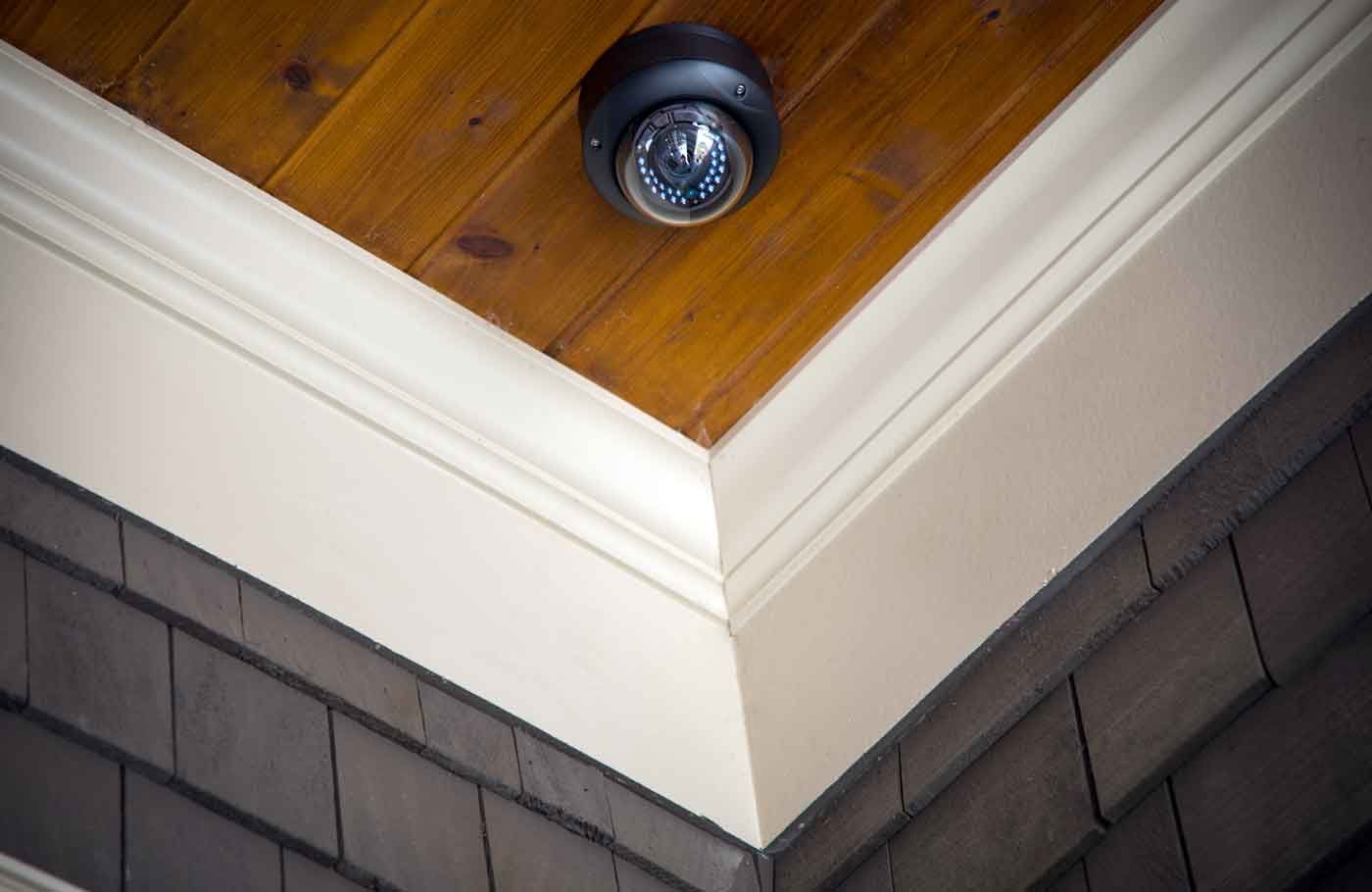 security camera on wooden ceiling