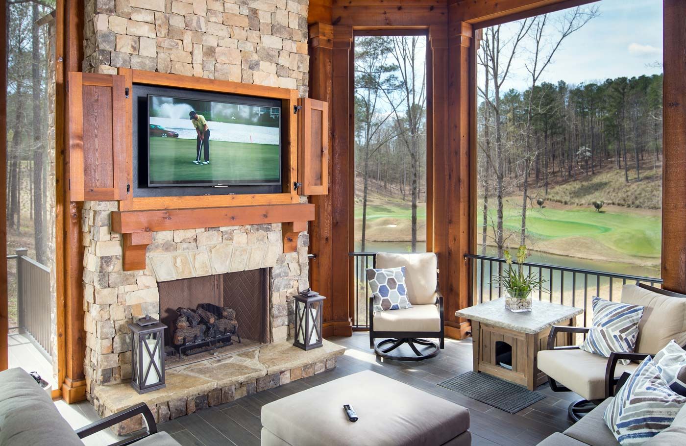 outdoor tv on porch with wooden accents