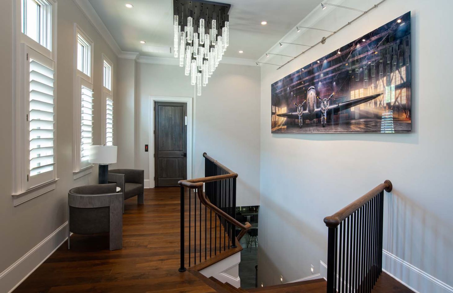 shot of patio outdoor with wooden accents and tv on wall