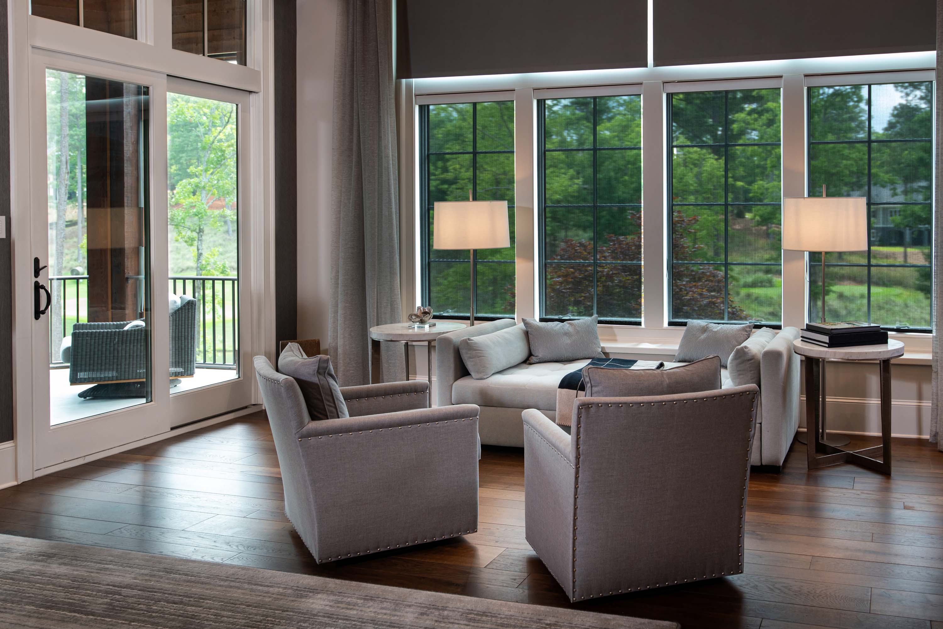 motorized blinds coming down on white trim window