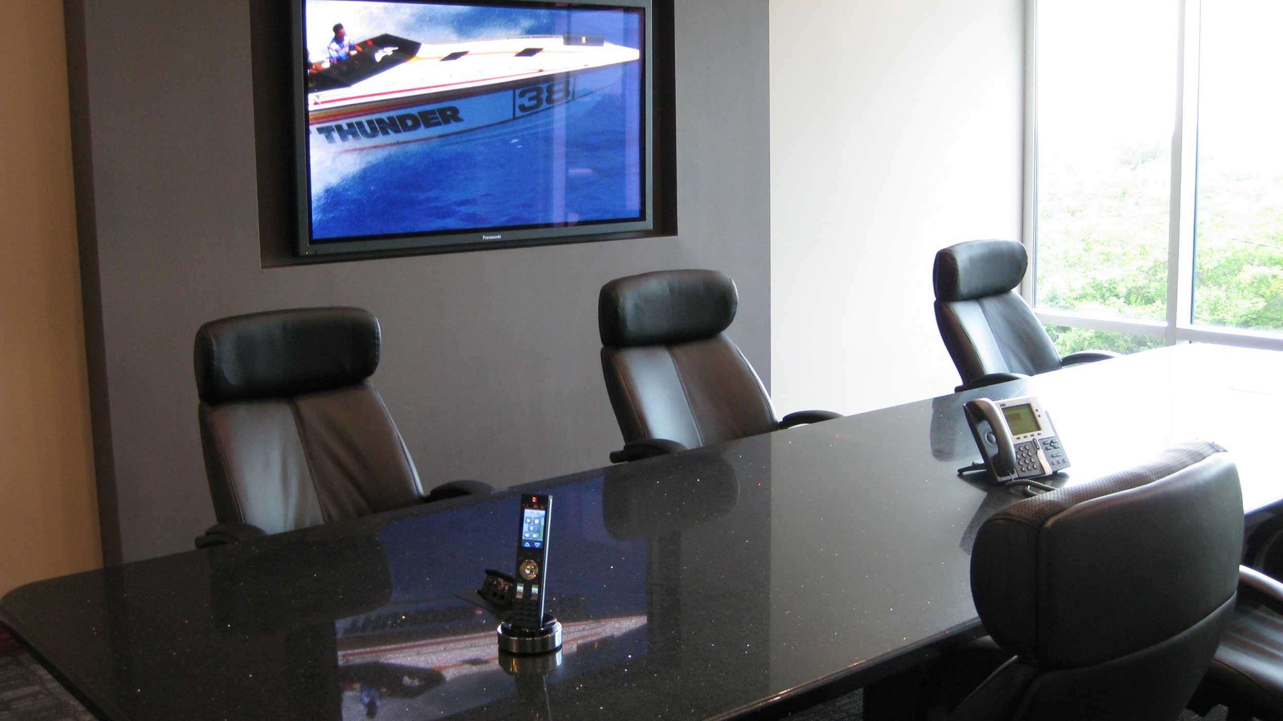 conference room with phone on black table